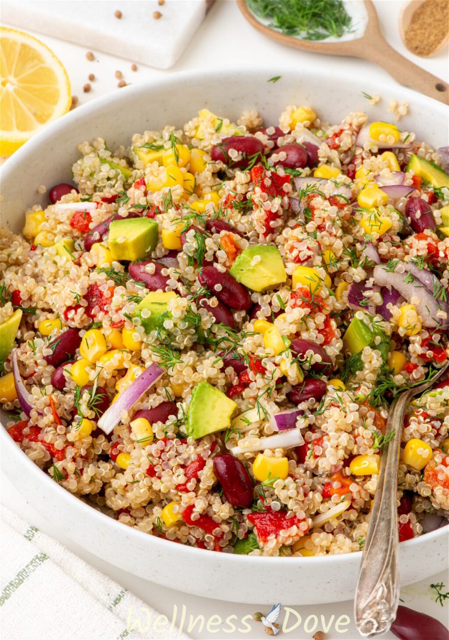 the vegan avocado quinoa salad in a large bowl - 3/4 angle