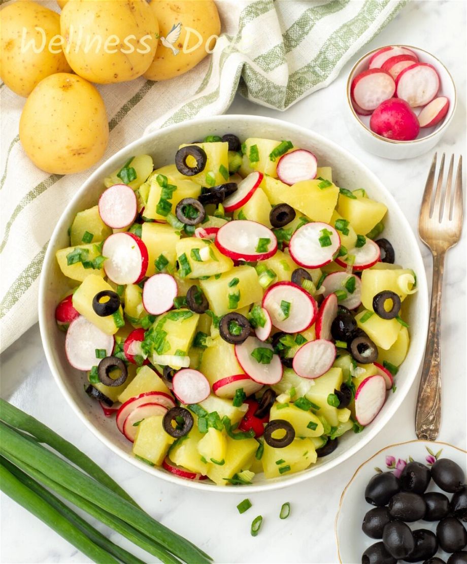 overhead view of the vegan no mayo potato salad in a large bowl