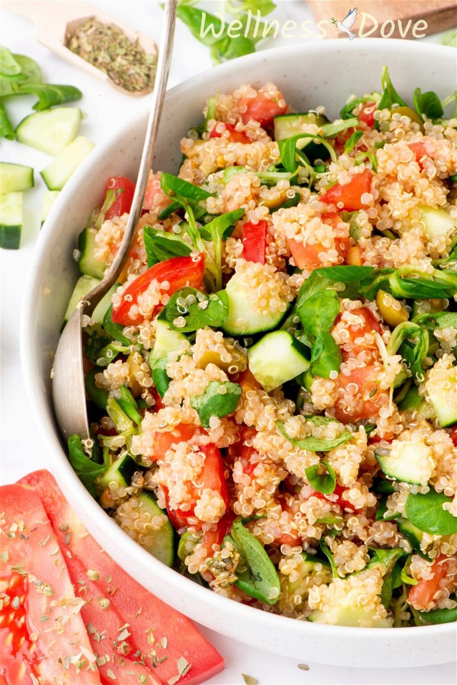 another close up 3/4 angle shot of the easy quinoa vegan summer salad in a large bowl