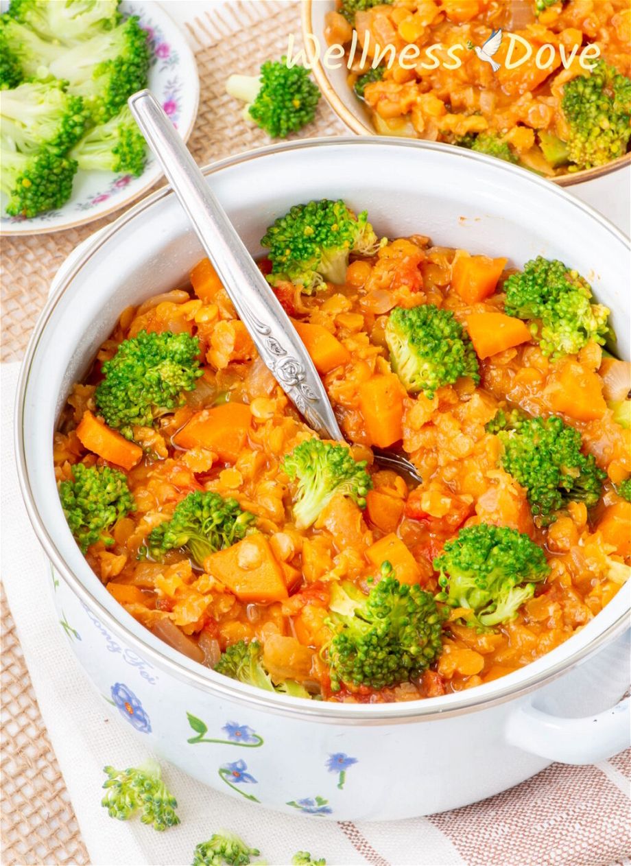 the Quick Broccoli Red Lentil Vegan Soup in a small pot with a spoon stuck in it