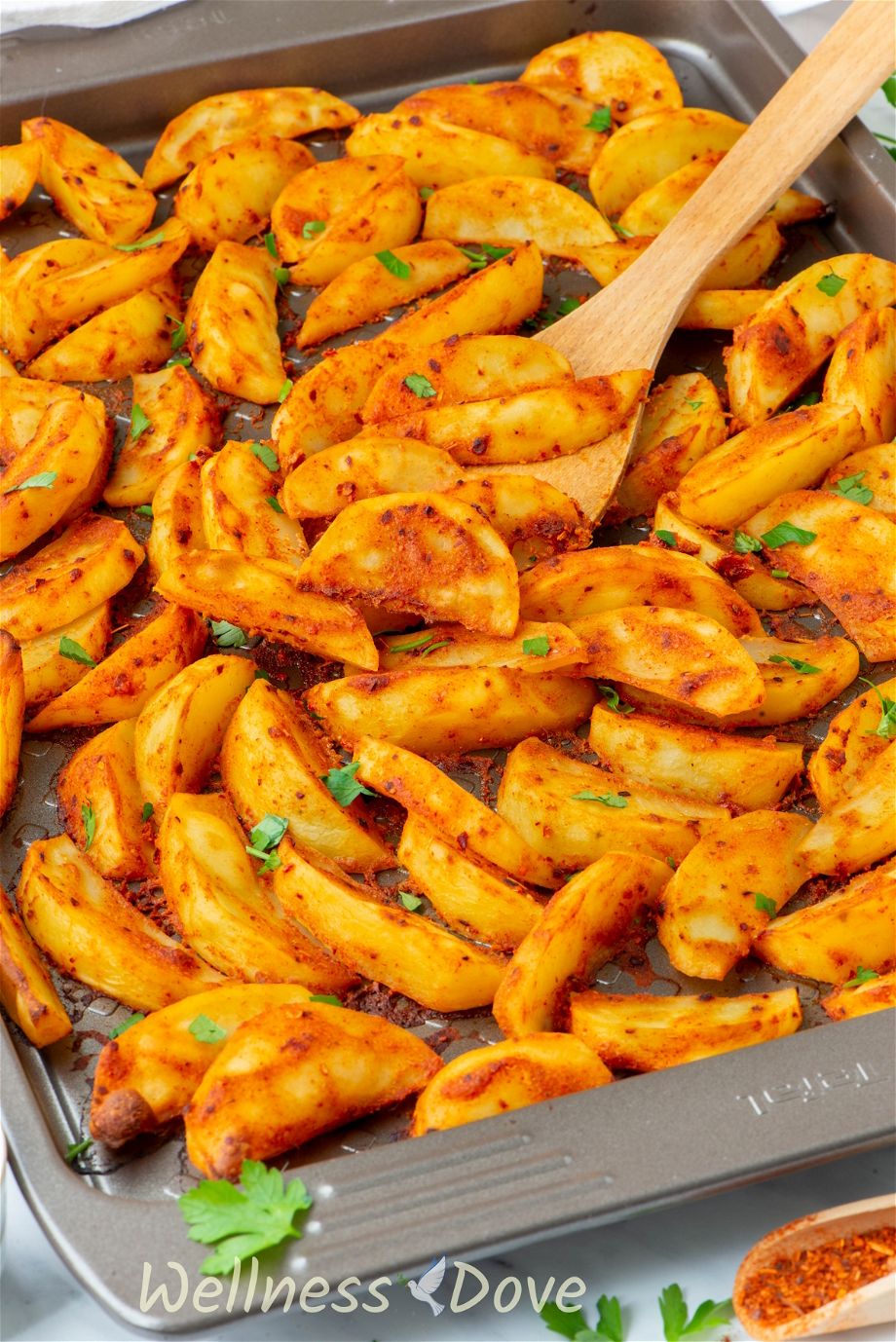 the Baked Mustard Potato Vegan Wedges in a baking tray