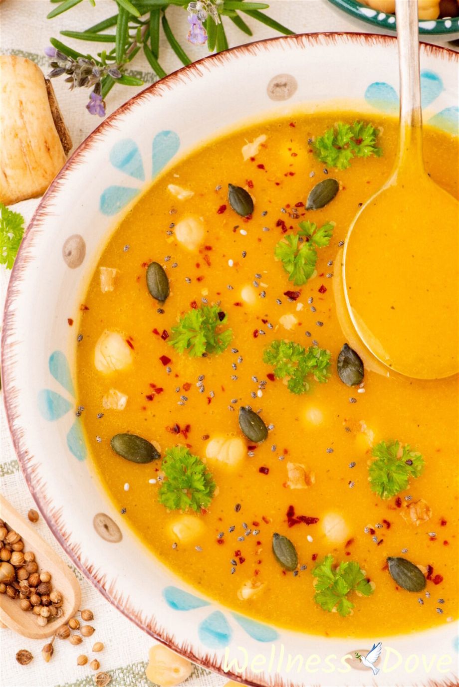 a macro photo of the Squash & Parsnip Vegan Soup in a bowl